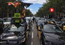 Reunión del sector del taxi en la Delegación del Gobierno en Barcelona para poner freno a los VTC en España El sector del taxi colapsa Barcelona para poner freno a los VTC en España