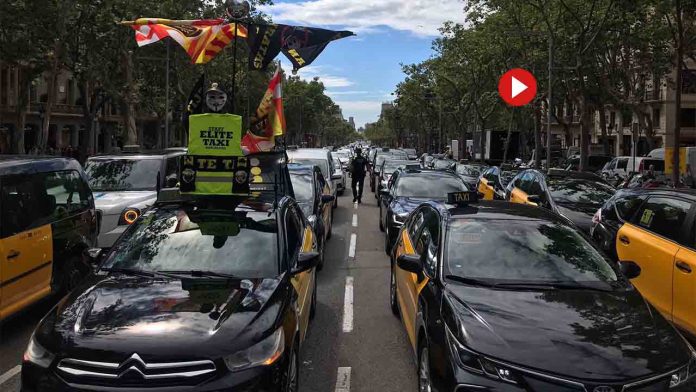 El sector del taxi colapsa Barcelona para poner freno a los VTC en España
